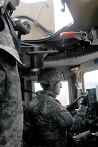 Fort Hunter-Liggett - U.S. Army Reserve military police Spc. Bradley Schopf from the 341st MP Company, of Mountain View, California, drives a High Mobility Multi-Purpose Wheeled Vehicle during a qualification table at Fort Hunter-Liggett, California, May 4. The 341st MP Co. is one of the first units in the Army Reserve conducting a complete 6-table crew-serve weapon qualification, which includes firing the M2, M249 and M240B machine guns both during the day and night. (U.S. Army photo by Sgt. Marco Gutierrez)