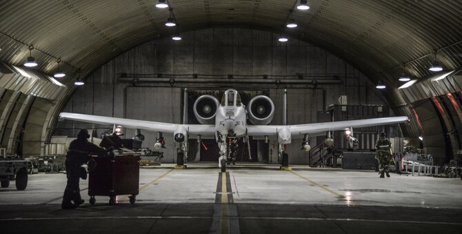 Airmen from the 51st Aircraft Maintenance Squadron prepare an A-10 Thunderbolt II for a training mission during exercise Beverly Herd 16-01 at Osan Air Base, Republic of Korea, May 10, 2016. The A-10 is a multi-role, close-air support air asset that features a 30mm cannon on the front of the aircraft. BH 16-01 is a week-long readiness exercise for the 51st Fighter Wing that includes a plethora of scenarios (U.S. Air Force photo by Tech. Sgt. Travis Edwards/Released)
