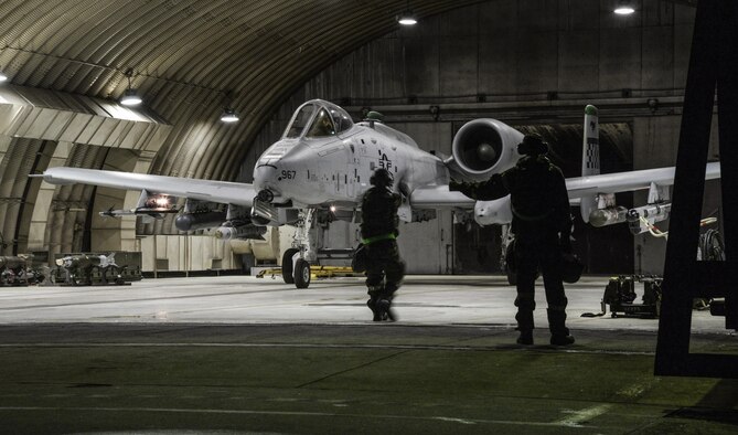 A crew chief from the 51st Maintenance Group marshals an A-10 Thunderbolt II prior to takeoff for a training mission during exercise Beverly Herd 16-01 at Osan Air Base, Republic of Korea, May 10, 2016. The 25th Fighter Squadron arrived with A-10s to Osan in October 1993. BH 16-01 is a week-long readiness exercise for the 51st Fighter Wing that includes a plethora of scenarios (U.S. Air Force photo by Tech. Sgt. Travis Edwards/Released)