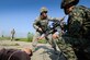 Staff Sgt. John Gavin, center, a 51st Security Forces Squadron fire team leader, issues instructions to disarm simulated opposing forces during a Beverly Herd 16-01 training scenario May 11, 2016, at Osan Air Base, South Korea. The weeklong exercise prepares the 51st Fighter Wing with scenarios like chemical, biological, radioactive, and nuclear response, active shooter and opposing forces. (U.S. Air Force photo/Senior Airman Dillian Bamman)