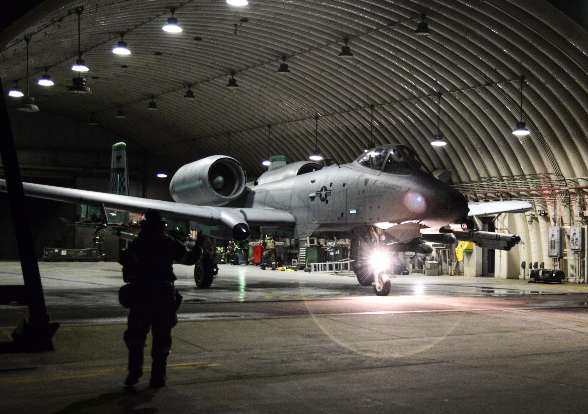 A crew chief from the 51st Maintenance Group marshals an A-10 Thunderbolt II prior to takeoff for a training mission during exercise Beverly Herd 16-01 at Osan Air Base, Republic of Korea, May 10, 2016. The 25th Fighter Squadron arrived with A-10s to Osan in October 1993. BH 16-01 is a week-long readiness exercise for the 51st Fighter Wing that includes a plethora of scenarios (U.S. Air Force photo by Tech. Sgt. Travis Edwards/Released)