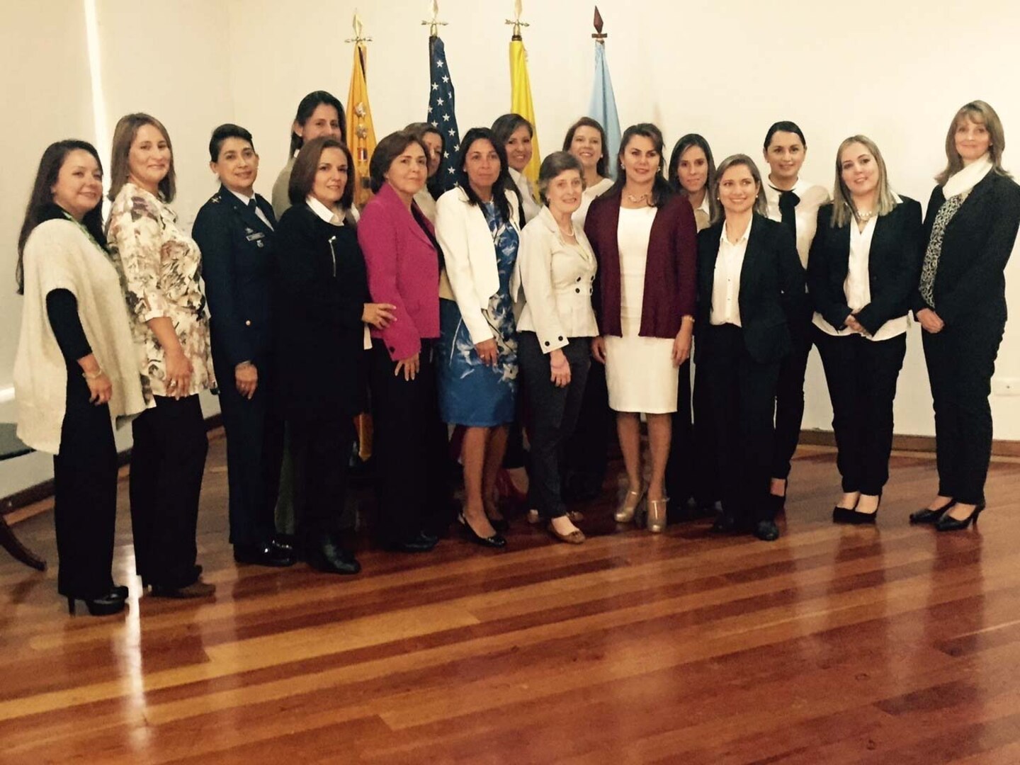 Barbara Livingston, wife of U.S. Army Maj. Gen. Robert E. Livingston, Jr.,  the adjutant general for South Carolina, stands with spouses of Colombian military leaders following a family programs presentation during a state partnership program engagement in Bogota, Colombia, April 15, 2016.  