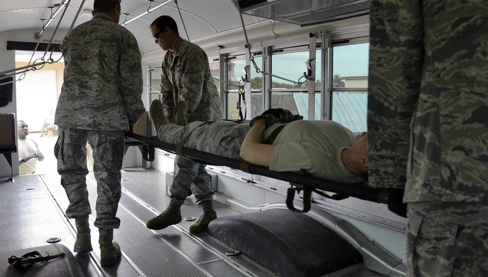 Members of the 920th Aeromedical Staging Squadron train May 11 with their counterparts from the 932nd Airlift Wing from Scott AFB, Ill., in preparation for a joint medical exercise scheduled to take place here at Patrick AFB May 14-15. (U.S. Air Force photo/Master Sgt. Paul Flipse)