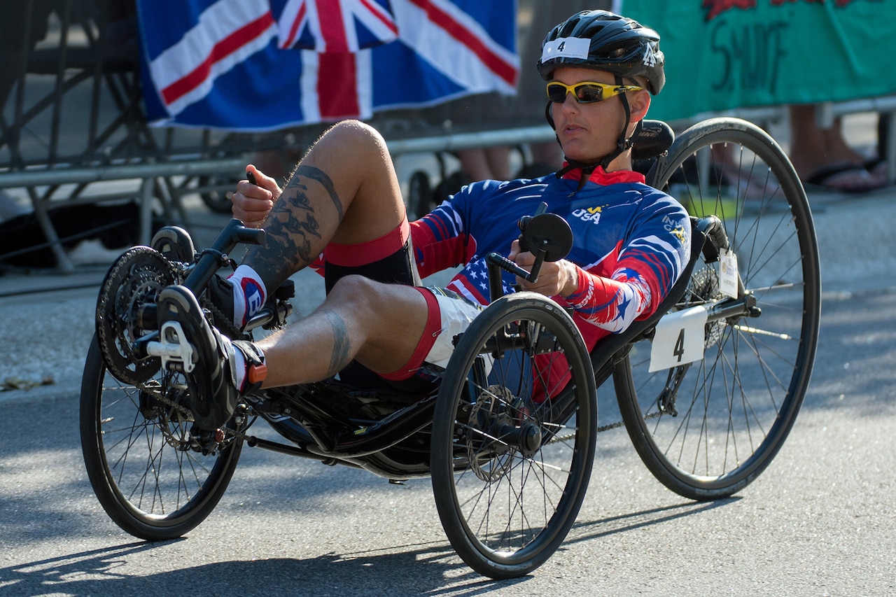 Army Sgt. Aaron Stewart races a recumbent bike during the 2016 Invictus Games in Orlando, Fla., May 10, 2016. DoD photo by EJ Hersom