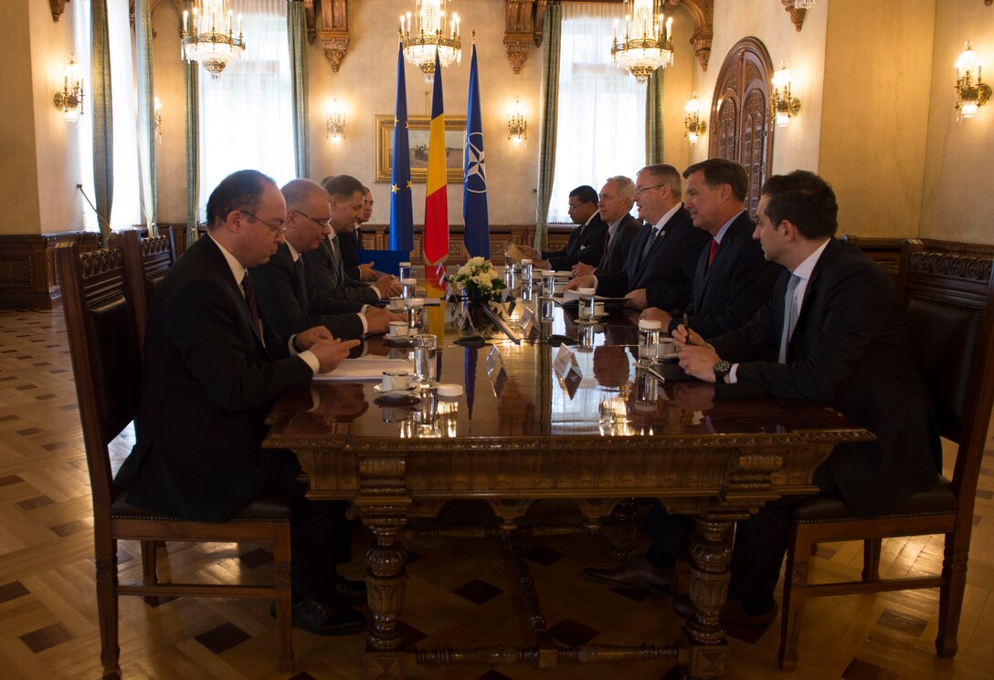Deputy Defense Secretary Bob Work meets with Romanian President Klaus Iohannis in Bucharest, Romania, May 11, 2016. Work is in Romania to strengthen and reassure alliances. DoD photo by Navy Petty Officer 1st Class Tim D. Godbee