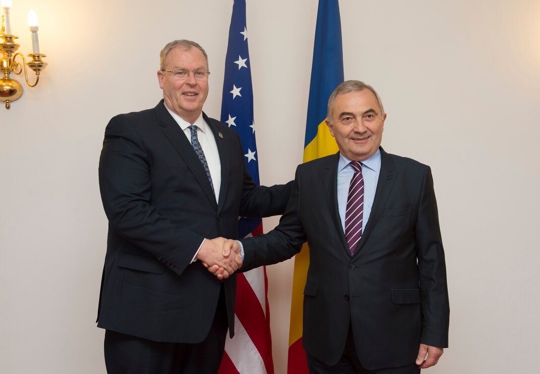 Deputy Defense Secretary Bob Work poses for a photo with Romanian Foreign Affairs Minister Lazar Comanescu in Bucharest, Romania, May 11, 2016. DoD photo by Navy Petty Officer 1st Class Tim D. Godbee
