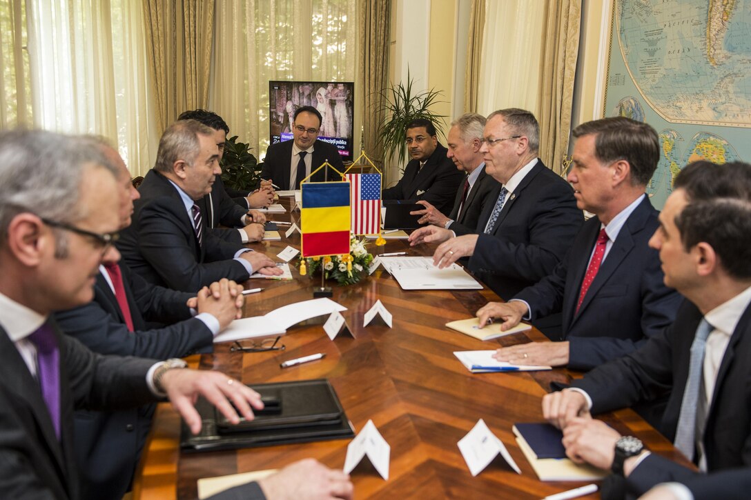 Deputy Defense Secretary Bob Work, third from right, meets with Romanian Foreign Affairs Minister Lazar Comanescu, third from left, in Bucharest, Romania, May 11, 2016. Work is in the Central European country to strengthen and reassure alliances. DoD photo by Navy Petty Officer 1st Class Tim D. Godbee