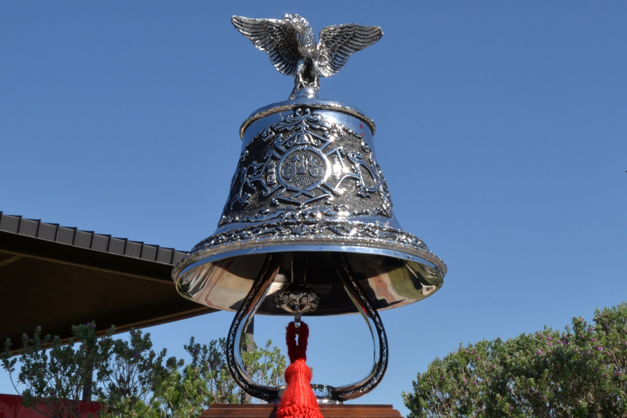 A bell stands in honor of every firefighter that has fallen in the line of duty durring Department of Defense Fallen Firefighter Memorial ceremony on Goodfellow Air Force Base, Texas, May 6, 2016. The 312th Training Squadron holds a memorial every year to recognize the firefighters, and adds new names to the memorial as needed. (U.S. Air Force photo by Airman 1st Class Randall Moose/Released)