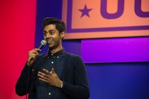 Comedian, actor and senior correspondent for the "Daily Show," Hasan Minhaj, gives a comedic performance to a group of service members during a USO celebration of its 75th birthday, Military Appreciation Month and the 5th Anniversary of Joining Forces in a hangar on Joint Base Andrews May 5. The special event, called a “Celebration of Service,” featured special guest speakers President and First Lady Obama, Vice President and Second Lady Biden and comedic performances by Jon Steward, David Letterman, Judd Apatow, Mike Birbiglia, Kristen Schaal, Hasan Minhaj, John Mulaney and Jeff Ross. (U.S. Air Force photo/Staff Sgt. Kat Justen)