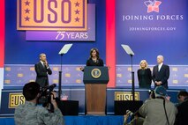 First Lady Michelle Obama gives remarks during a USO celebration of its 75th birthday, Military Appreciation Month and the 5th Anniversary of Joining Forces in a hangar on Joint Base Andrews May 5. The special event, called a “Celebration of Service,” featured special guest speakers President and First Lady Obama, Vice President and Second Lady Biden and comedic performances by Jon Stewart, David Letterman, Judd Apatow, Mike Birbiglia, Kristen Schaal, Hasan Minhaj, John Mulaney and Jeff Ross. (U.S. Air Force photo/Staff Sgt. Kat Justen)
