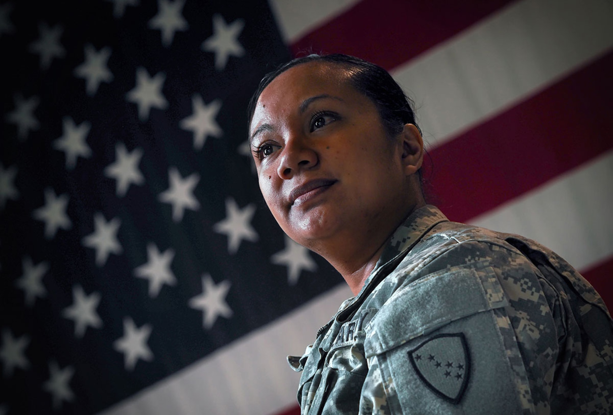 Alaska Army National Guard Sgt. 1st Class Sheila Tadina, assigned to Echo Company, 1st Battalion, 207th Aviation Regiment, poses for a portrait at the Alaska National Guard armory on Joint Base Elmendorf-Richardson, Alaska, Tuesday, May 10, 2016. Tadina immigrated to the United States when she was four-years-old from San Fernando, La Union, The Philippines, became a naturalized U.S. citizen, and joined the Army at 18. (U.S. Air Force photo/Justin Connaher)