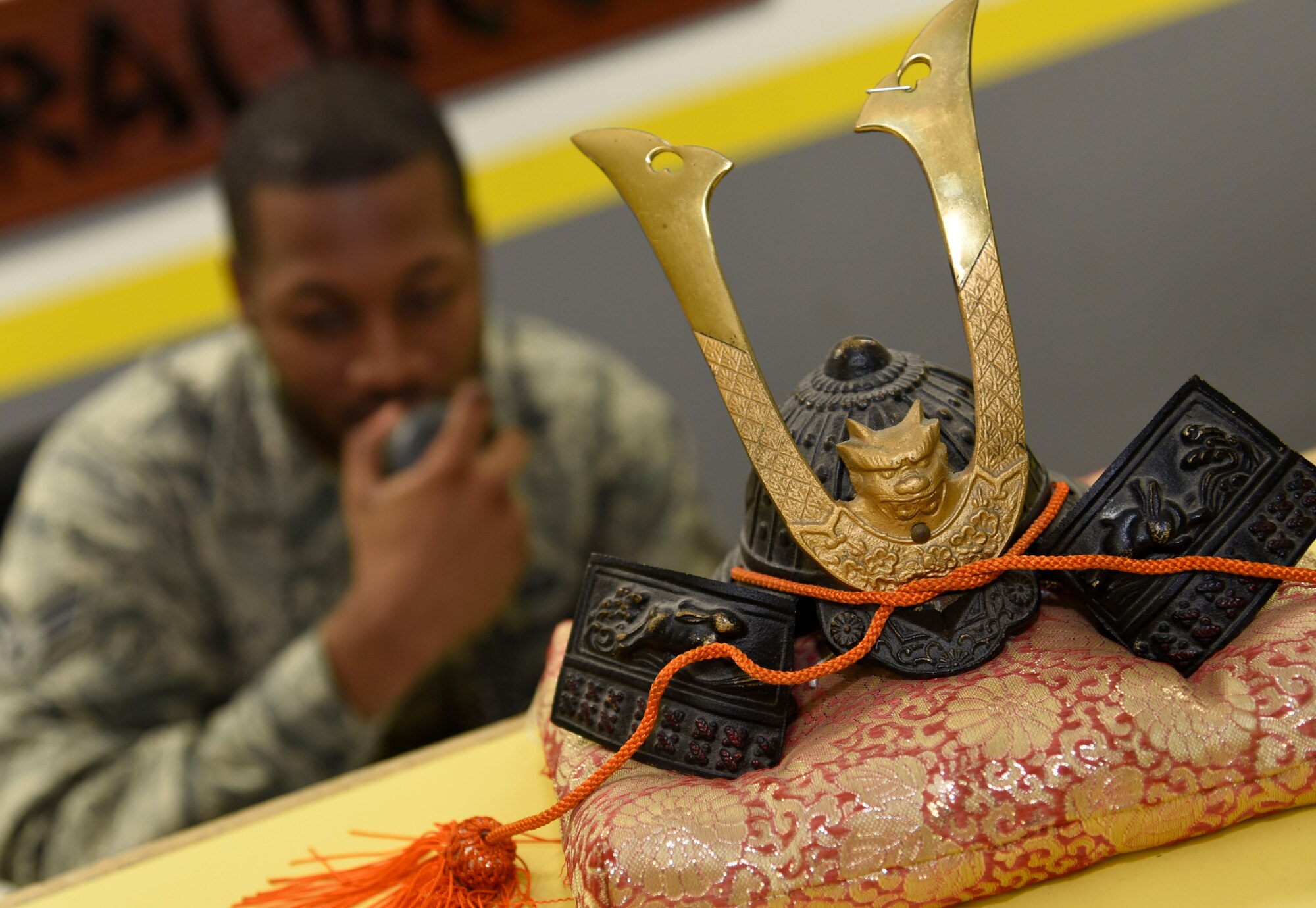 U.S. Air Force Senior Airman Donald Harris, a squadron aviation resource manager with the 14th Fighter Squadron, speaks into a radio at Misawa Air Base, Japan, May 10, 2016. Harris coordinates the status of each F-16 Fighting Falcon between aircrew members and maintainers to ensure safety before flight. Harris hails from Moreno Valley, California. (U.S. Air Force photo by Airman 1st Class Jordyn Fetter)