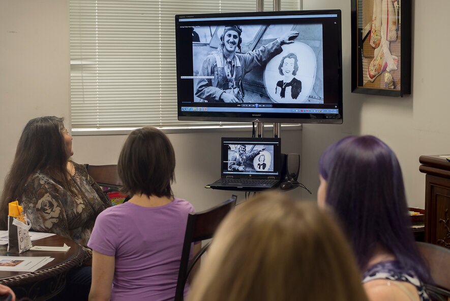 A video commemorating the sacrifices made by military dependents is played during the Military Spouse Appreciation Day open house at Yokota Air Base, Japan, May 6, 2016. There are roughly 3,600 dependents at Yokota supporting the mission by generating Airmen. (U.S. Air Force photo by Senior Airman David C. Danford/Released)