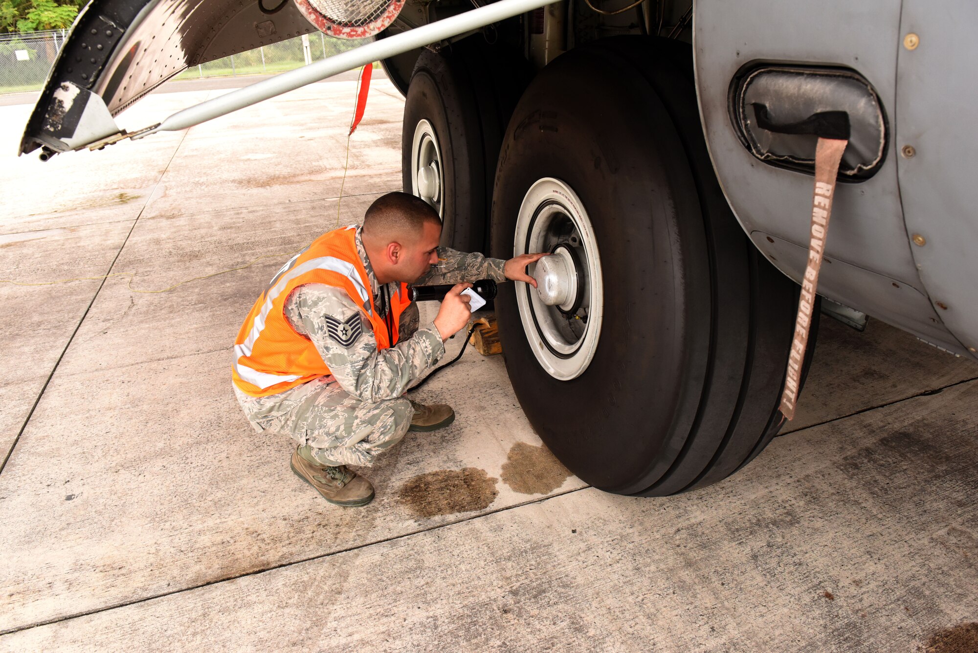U.S. Air Force Staff Sgt. Hector Alamo, 156th Wing Inspection Team members, completes a maintenance inspections on a Puerto Rico Air National Guard WC-130 Hercules aircraft during an Air Mobility Command Inspector General visit on Muñiz Air National Guard Base, Carolina, Puerto Rico, April 30.  Members of the AMC IG team completed a mid-point review visit to evaluate the 156th WIT inspection process. (U.S. Air National Guard photo by Tech. Sgt. Efraín Sánchez)