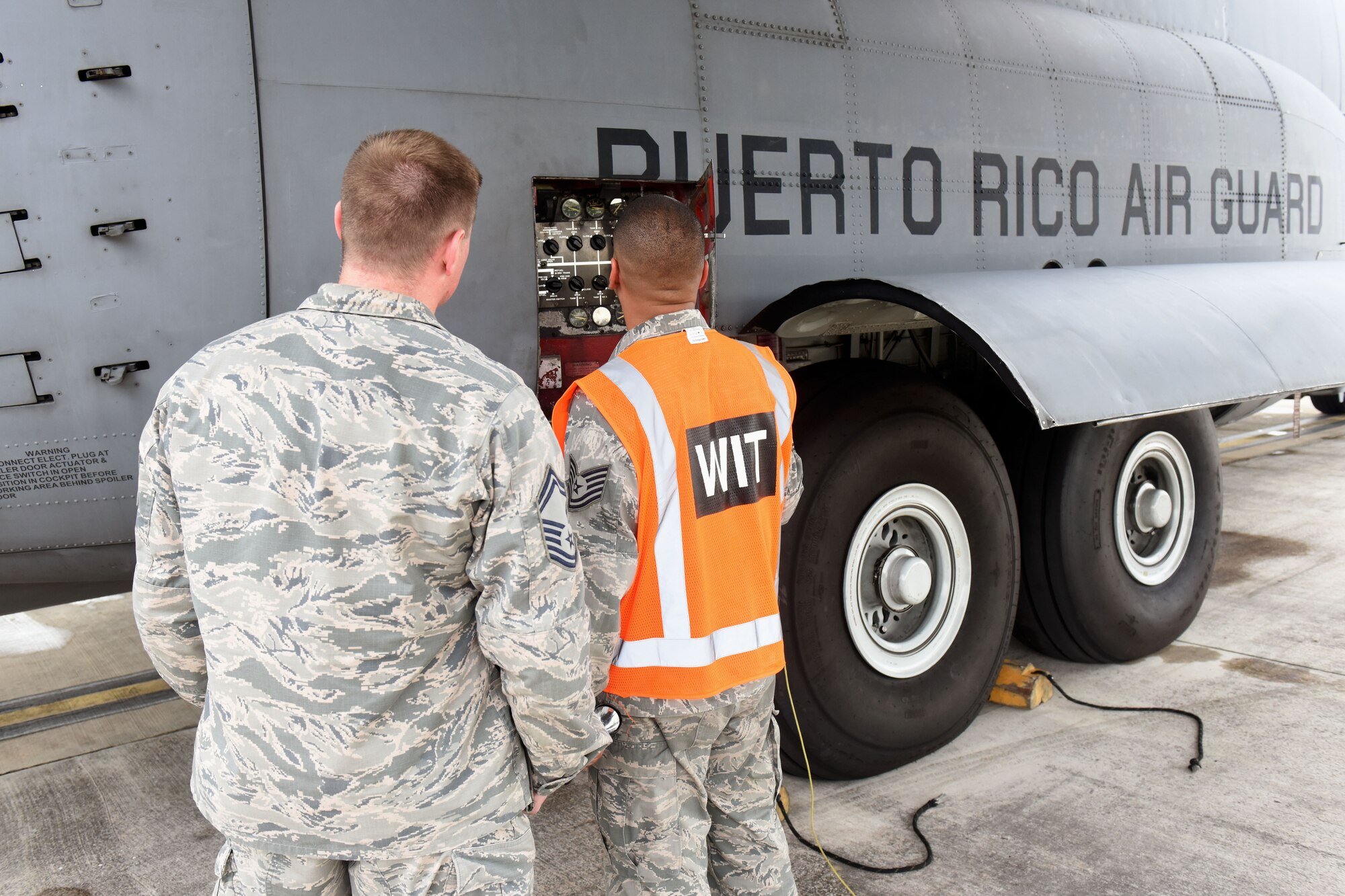 U.S. Air Force members of the Air Mobility Command Inspector General team complete a mid-point review to evaluate the 156th Airlift Wing Inspection Team evaluation process. The 156th WIT conducted inspections on the wing's compliance to Air Force Instruction during a category 5 hurricane exercise at Muñiz Air National Guard Base, Carolina, Puerto Rico, April 30. (U.S. Air National Guard photo by Tech. Sgt. Efraín Sánchez)