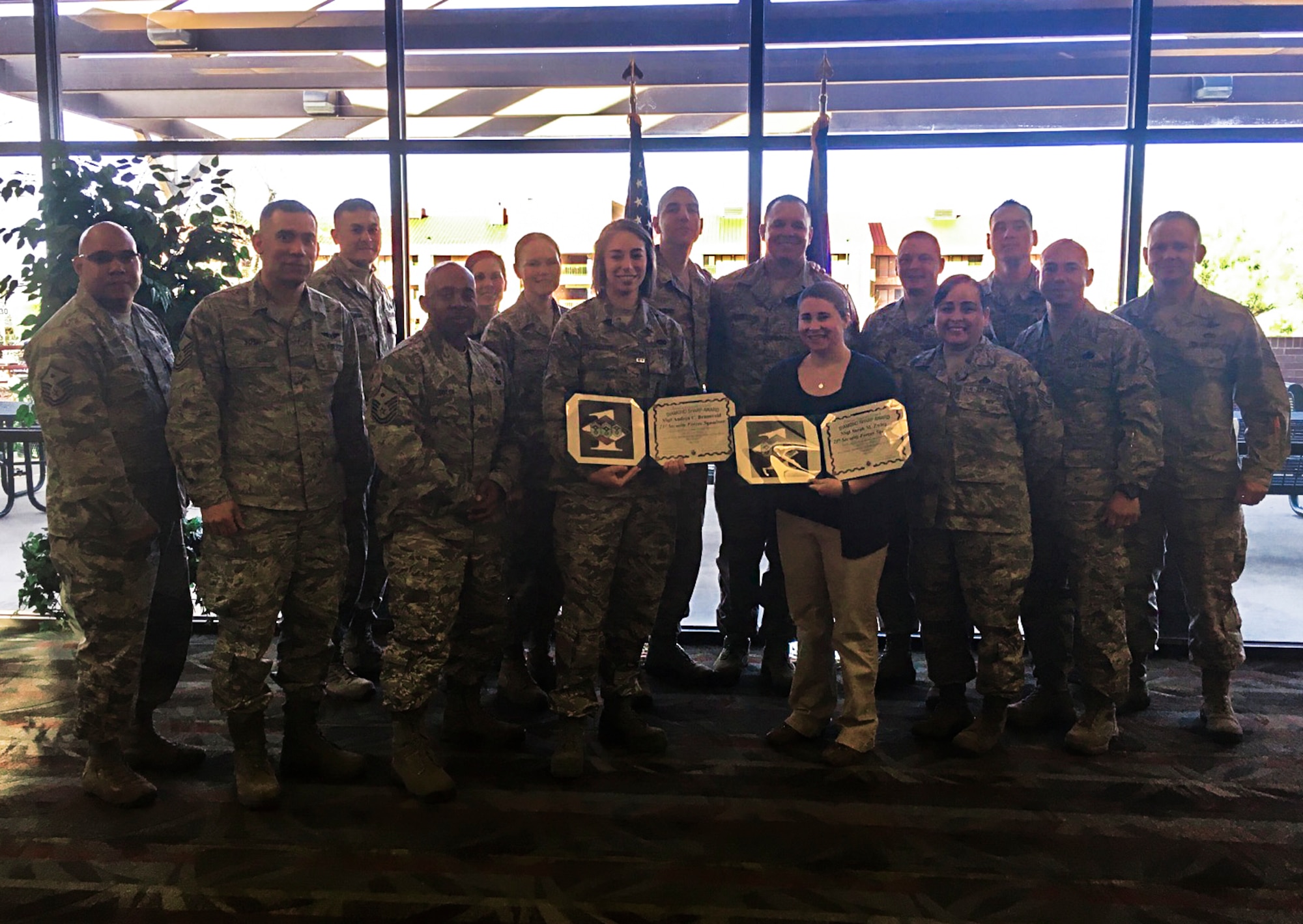 PETERSON AIR FORCE BASE, Colo.- The Peterson Diamond Council presented the May Diamond Sharp award to Staff Sgt. Sarah Zwieg, 21st Security Forces Squadron and Staff Sgt. Andrea Brunsvold, 21st SFS on May 5, 2016. The Diamond Sharp award recognizes superior performers. (Courtesy photo)
