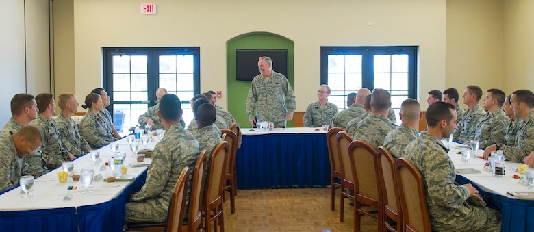 Air Force Chief of Staff Gen. Mark A. Welsh III speaks with space operators during a roundtable at the Golf Course at Patrick Air Force Base, Fla., May 9, 2016. During the discussion, operators were able to bring up their thoughts and concerns with the future of the space mission. The general and his wife, Betty, spent a day meeting with 45th Space Wing personnel, mission partners and their families, addressed their concerns and provided them with an Air Force-level perspective. (U.S. Air Force photo by Matthew Jurgens/Released)