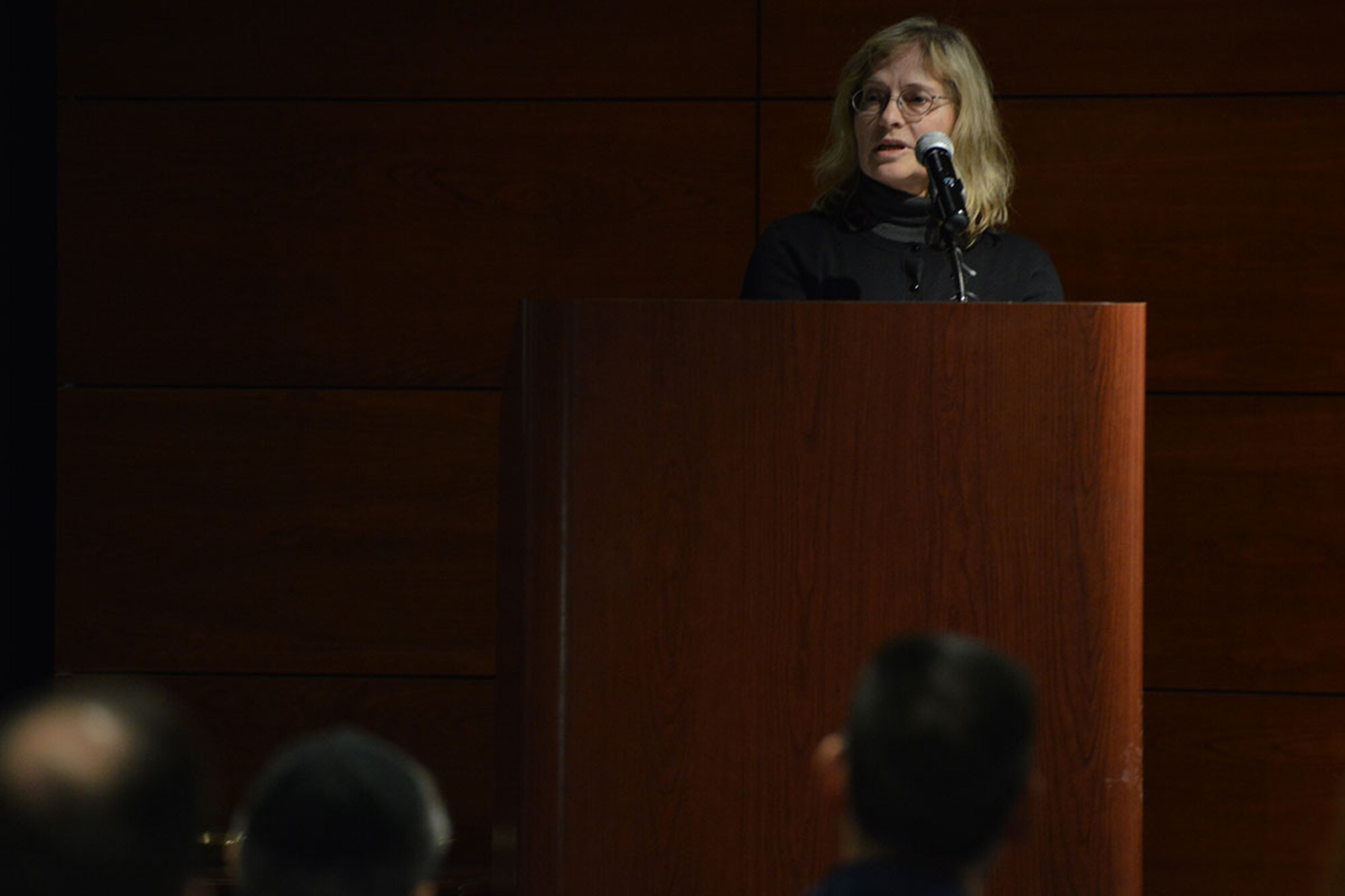 Leslie Fried, Alaska Jewish Museum curator, speaks about the history behind the Holocaust at the Holocaust Remembrance Day event at the Arctic Warrior Event Center on Joint Base Elmendorf-Richardson, Alaska, May 6, 2016. Fried’s speech focused on the historical aspect of the Holocaust, and she spoke at length about Kristallnacht, the “night of broken glass.” (U.S. Air Force photo by Airman 1st Class Javier Alvarez)