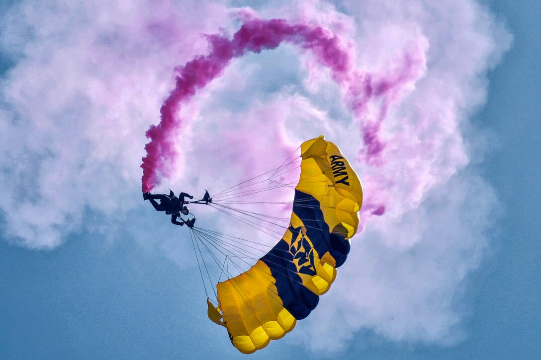 A member of the Golden Knights, the Army's aerial demonstration team, parachutes towards the ground during 2016 Friendship Day at Marine Corps Air Station Iwakuni, Japan, May 5, 2016. The team travels throughout the United States and overseas locations. Air Force photo by Senior Airman David Owsianka