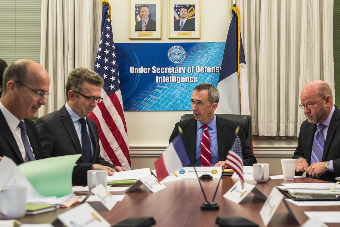 Marcel Lettre, center, undersecretary of defense of intelligence, hosts his French counterpart, Lt. Gen. Christophe Gomart, second from left, chief of defense intelligence, and other members of the French and U.S. military intelligence communities during the first meeting of the Lafayette Committee at the Pentagon, May 11, 2016. This committee, expected to meet semiannually, will provide a venue for a review and exchange of ideas on successes and challenges in defense intelligence. Army photo by Spc. Trevor Wiegel



