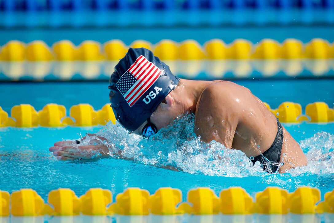 Army Sgt. Elizabeth Marks competes in the women’s breaststroke swimming finals during the 2016 Invictus Games in Orlando, Fla., May 11, 2016. Marks won the gold medal with a time of 42:67 seconds. DoD photo by Edward Joseph Hersom II