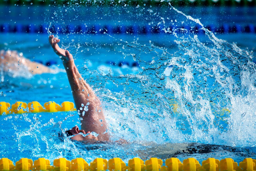 Army Staff Sgt. Tim Payne competes in the backstroke during the 2016 Invictus Games in Orlando, Fla. May 11, 2016. DoD photo by Edward Joseph Hersom II