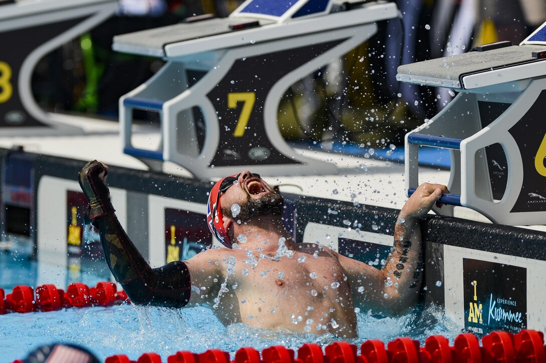 Former British Royal Marines Cpl. Paul Vice celebrates after winning the men’s 50-meter breaststroke during the 2016 Invictus Games in Orlando, Fla., May 11, 2016. Air Force photo by Tech. Sgt. Joshua L. DeMotts
