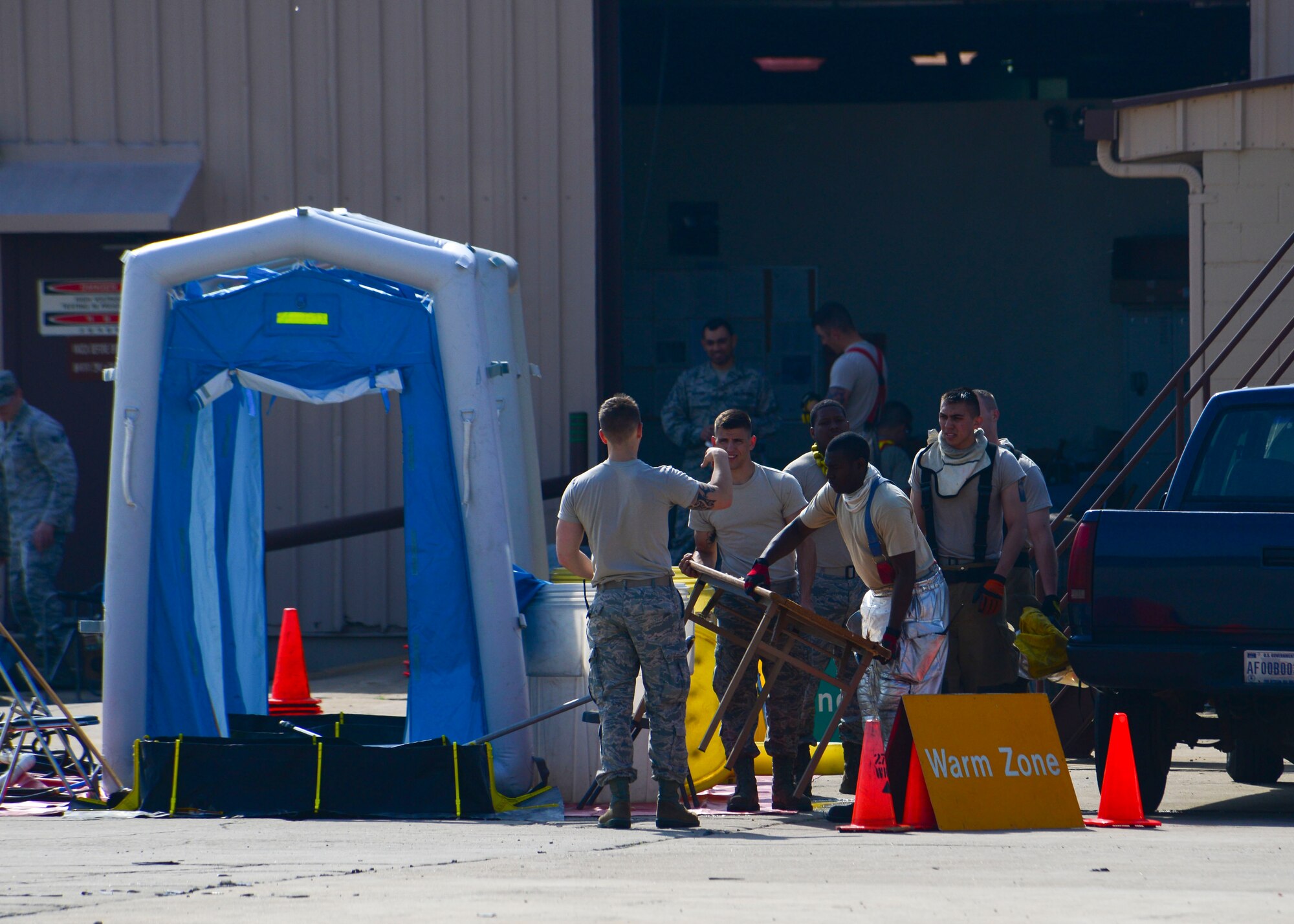 Firefighters from the 51st Civil Engineer Squadron set up a decontamination line during Exercise Beverly Herd 16-01 at Osan Air Base, Republic of Korea, May 12, 2016. Emergency responders from the 51st CES coordinated a training scenario in which a mock chemical improvised explosive device was discovered in the civil engineer compound. (U.S. Air Force photo by Senior Airman Victor J. Caputo/Released)