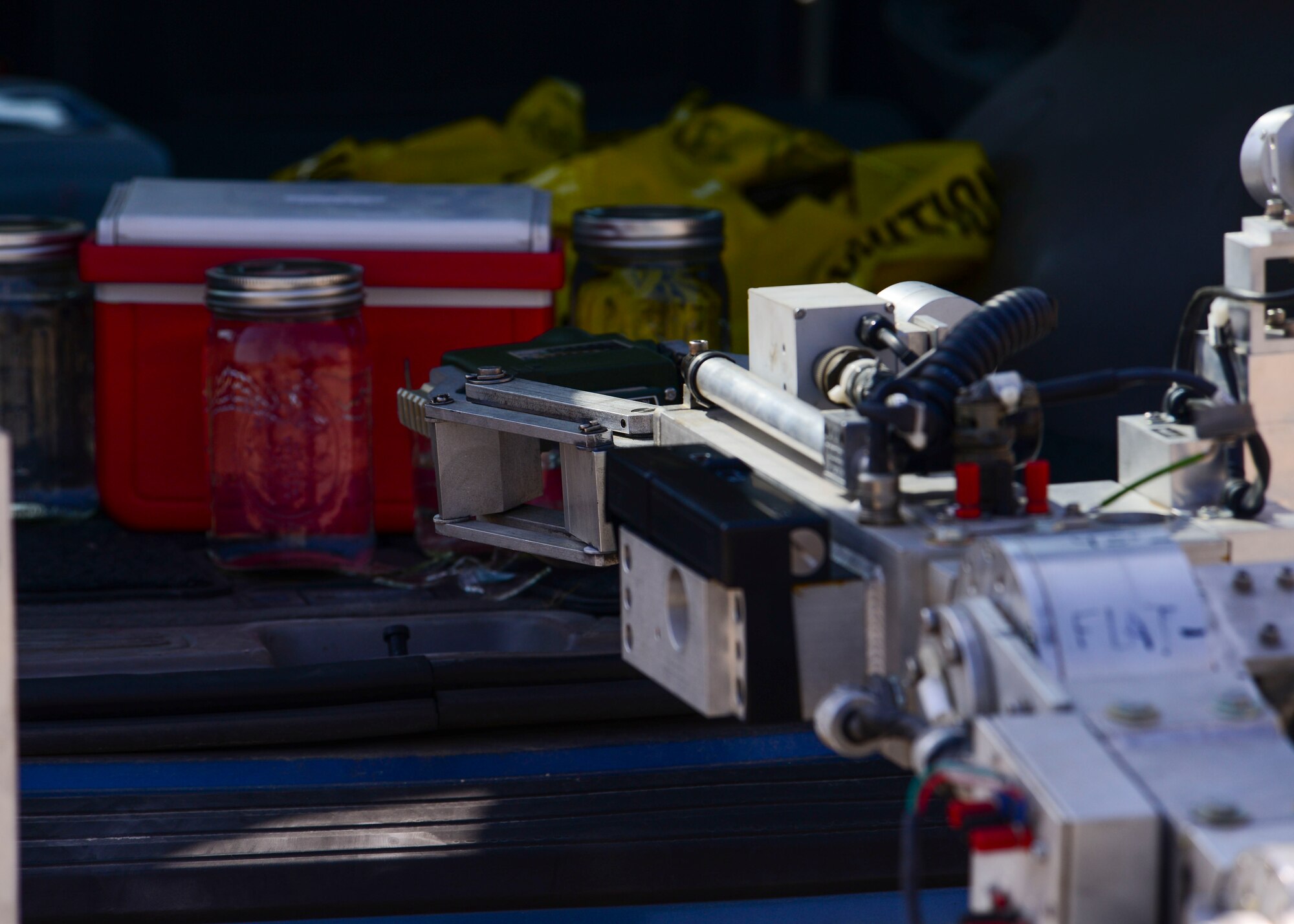 An F6A explosive ordnance disposal robot, operated by Airmen from the 51st Civil Engineer Squadron EOD flight, scans a mock bomb during Exercise Beverly Herd 16-01 at Osan Air Base, Republic of Korea, May 12, 2016.  Various agencies within the squadron had to work together during a training scenario to respond to the simulated threat of improvised explosive device with apossible biohazard attached. (U.S. Air Force photo by Senior Airman Victor J. Caputo/Released)