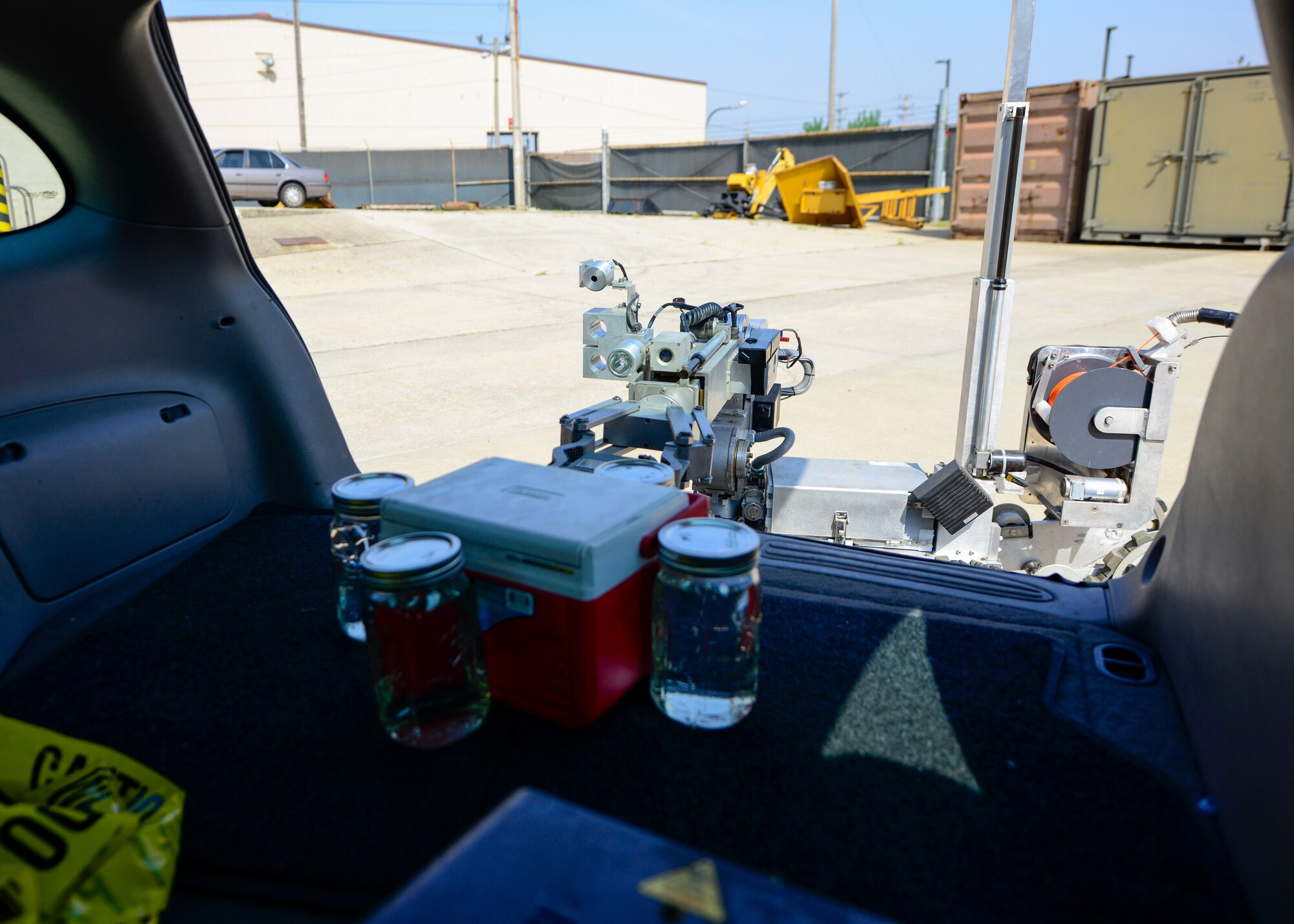 An F6A explosive ordnance disposal robot, operated by Airmen from the 51st Civil Engineer Squadron EOD flight, scans a mock bomb during Exercise Beverly Herd 16-01 at Osan Air Base, Republic of Korea, May 12, 2016.  Various agencies within the squadron had to work together during a training scenario to respond to the simulated threat of improvised explosive device with apossible biohazard attached. (U.S. Air Force photo by Senior Airman Victor J. Caputo/Released)