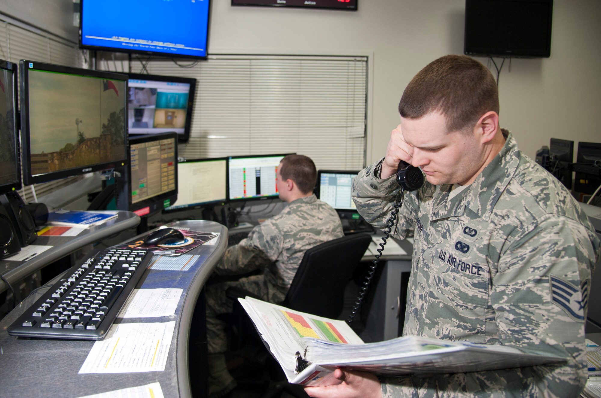 Staff Sgt. Zachary Pirrung, 51st Fighter Wing emergency action controller, mans his crew position in the command post on Osan Air Base, Republic of Korea, April 26, 2016. The 51st FW command post won the 2015 Medium Command Post of the Year award. (U.S. Air Force photo by Staff Sgt. Jonathan Steffen/Released)
