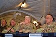 Brig. Gen. Arlan DeBlieck, center, commanding general of the 7th Mission Support Command, listens to a Commander's Update Brief during Exercise Anakonda Response 2016, Friday, April 29, 2016 at Papa Air Base in Hungary. For the roughly two-week long event, the U.S. organized a full assembly of military representation: Army, Navy, Marine Corps, Army Reserve, Army National Guard and Air National Guard. Also, the Hungarian military hosted the United Kingdom’s Royal Army and Corps of Royal Marines. 