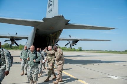 Soldiers from the 7th Mission Support Command exit a C-130 Friday, April 22, 2016 at Papa Air Base in Hungary to prepare for Exercise Anakdona Response 2016. For the roughly two-week long event, the U.S. organized a full assembly of military representation: Army, Navy, Marine Corps, Army Reserve, Army National Guard and Air National Guard. Also, the Hungarian military hosted the United Kingdom’s Royal Army and Corps of Royal Marines. 