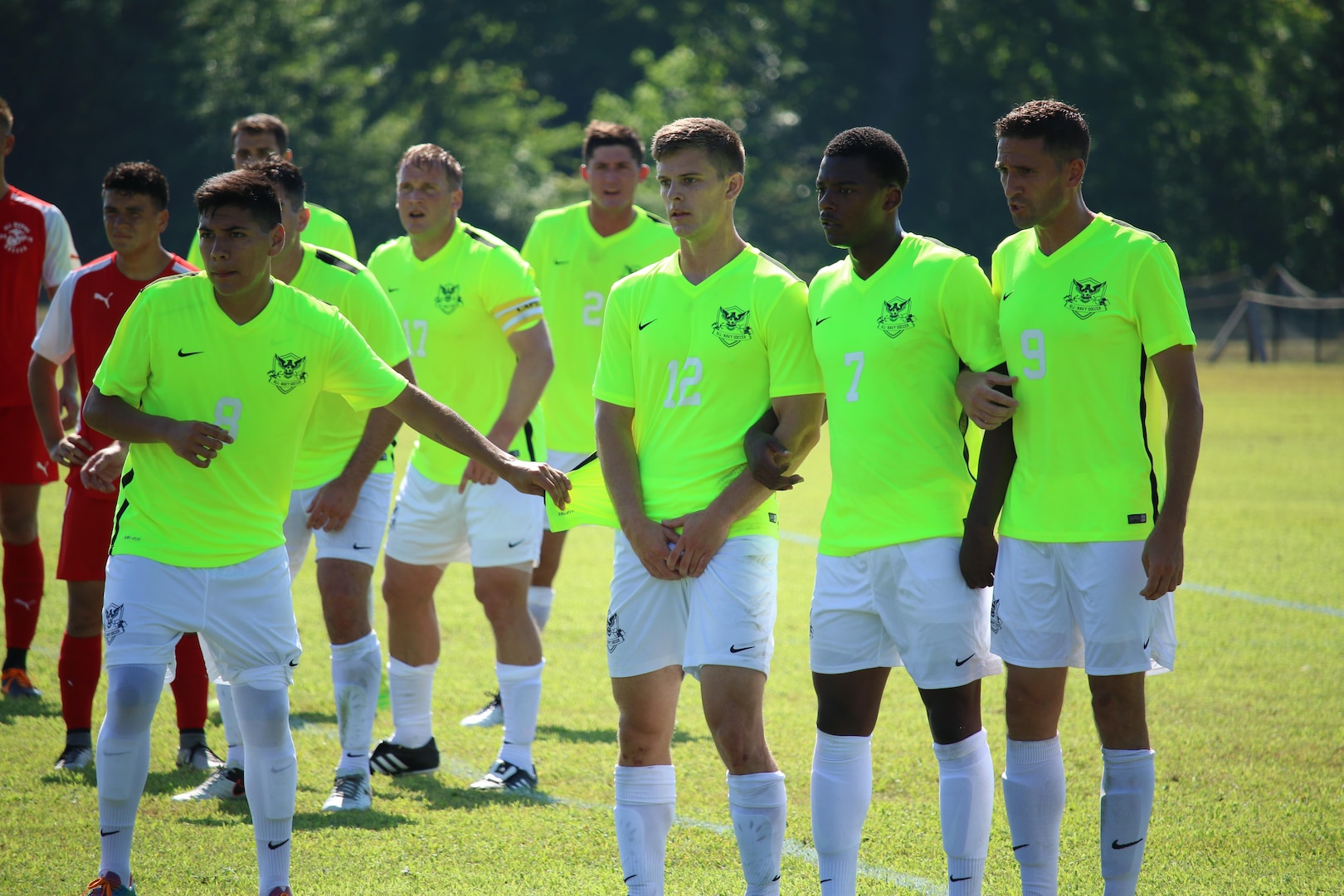 Navy defenders line up against a Marine Corps attack.  Navy defeated the Marines 2-1 to win match five of the 2016 Armed Forces Men's Soccer Championship hosted at Fort Benning, Ga from 6-14 May 2016.  Navy advances to the Championship Match versus Air Force.