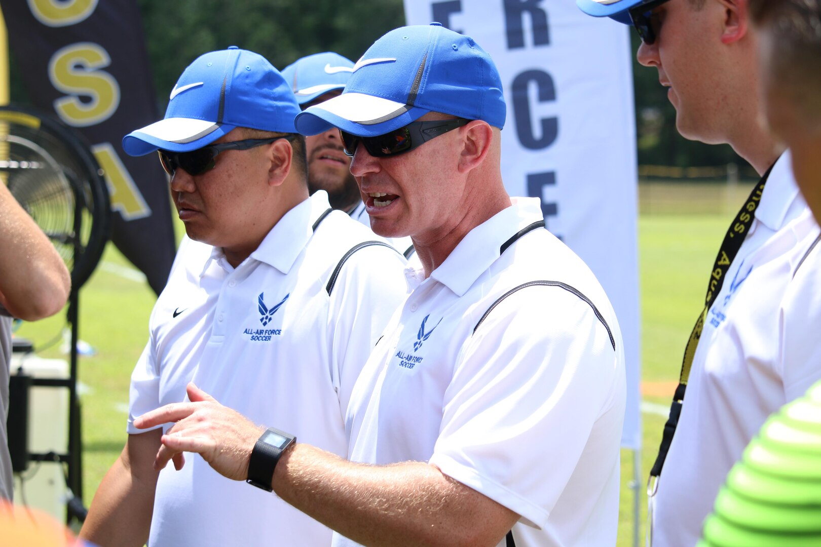 Air Force Head Coach Lt Col. Derrick Weyand (center) gives instructions during halftime as Air Force defeats Army 3-0 win in match six of the 2016 Armed Forces Men's Soccer Championship hosted at Fort Benning, Ga from 6-14 May 2016.  Air Force advances to the Championship Match versus Navy.