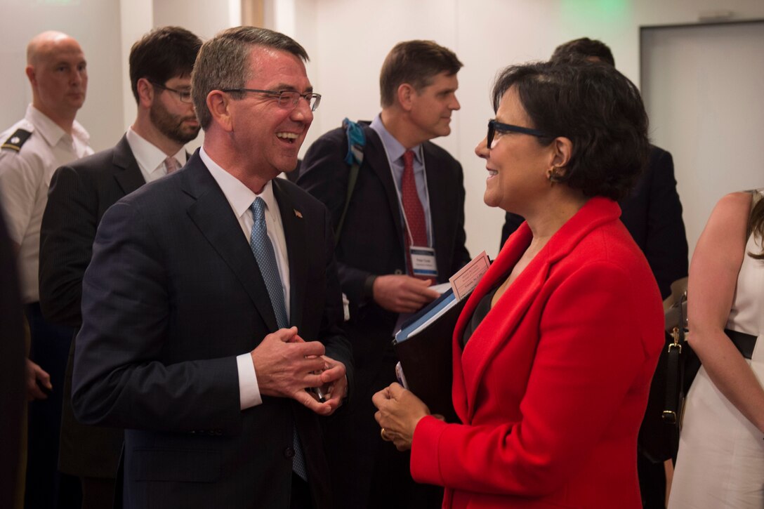 Defense Secretary Ash Carter shares a light moment with Commerce Secretary Penny Pritzker, right, during a break at the National Security Telecommunications Advisory Committee meeting at Intel Corporation in Santa Clara, Calif., May 11, 2016. DoD photo by Air Force Senior Master Sgt. Adrian Cadiz