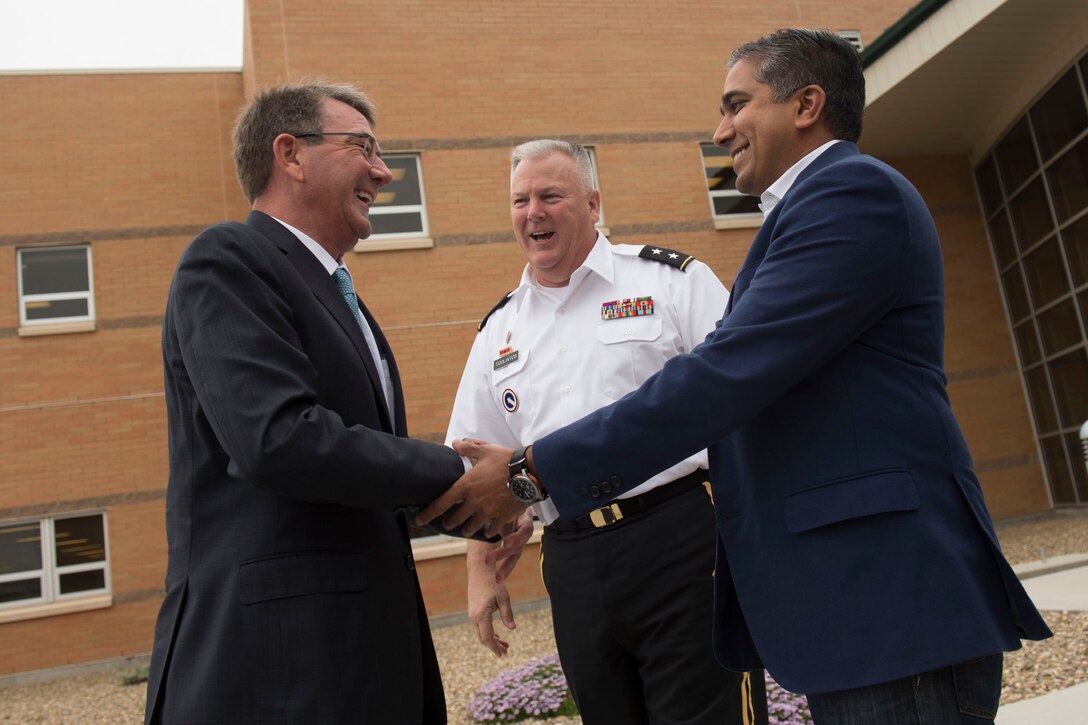 Defense Secretary Ash Carter receives a warm welcome from Raj Shah, the newly appointed managing director of Defense Innovation Unit Experimental, as he arrives in California, May 11, 2016. Carter later spoke with the unit's employees during his trip to California to meet with technology leaders. DoD photo by Air Force Senior Master Sgt. Adrian Cadiz
