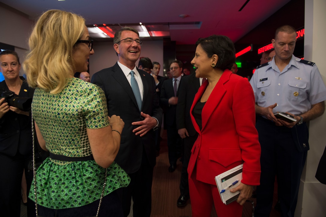 Defense Secretary Ash Carter shares a light moment with Commerce Secretary Penny Pritzker, right, as they arrive for the National Security Telecommunications Advisory Committee meeting at Intel Corporation in Santa Clara, Calif., May 11, 2016. DoD photo by Air Force Senior Master Sgt. Adrian Cadiz