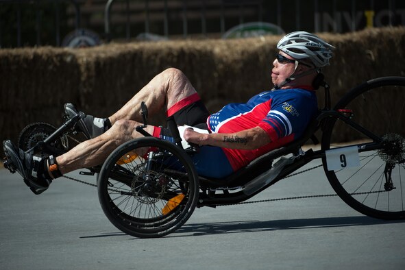 Master Sgt. Israel Del Toro Piper races a recumbent bike during the 2016 Invictus Games in Orlando, Fla., May 10, 2016. (Defense Department photo/EJ Hersom)
