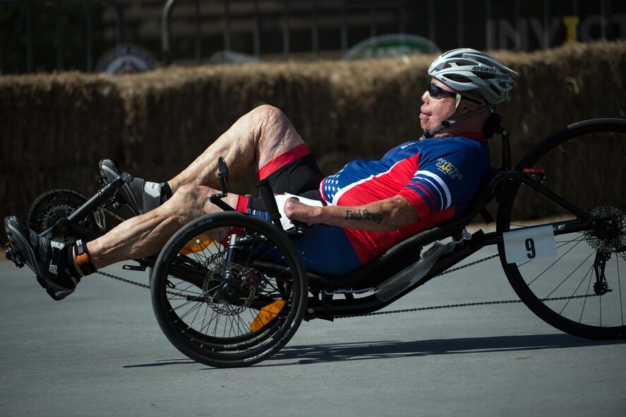Master Sgt. Israel Del Toro Piper races a recumbent bike during the 2016 Invictus Games in Orlando, Fla., May 10, 2016. (Defense Department photo/EJ Hersom)
