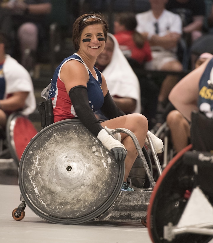 Air Force Staff Sgt. Sebastiana Lopez-Arellano smiles as the U.S. team defeats the Australian team in their semifinal wheelchair rugby match during the 2016 Invictus Games in Orlando, Fla., May 11, 2016. DoD photo by Roger Wollenberg