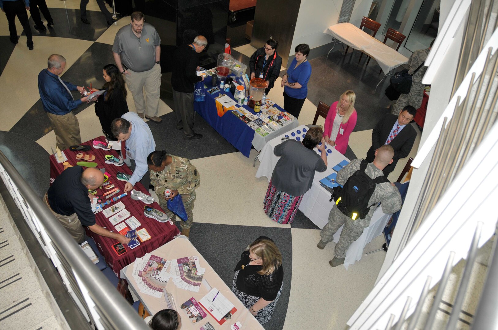McNamara HQC employees gather information from vendors at the Annual Health and Safety Expo, May 11 in the HQC Café.