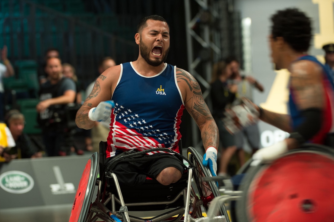 Marine Corps veteran Jorge Salazar reacts to scoring a point in the gold medal wheelchair rugby match during the 2016 Invictus Games in Orlando, Fla., May 11, 2016. DoD photo by Edward Joseph Hersom II