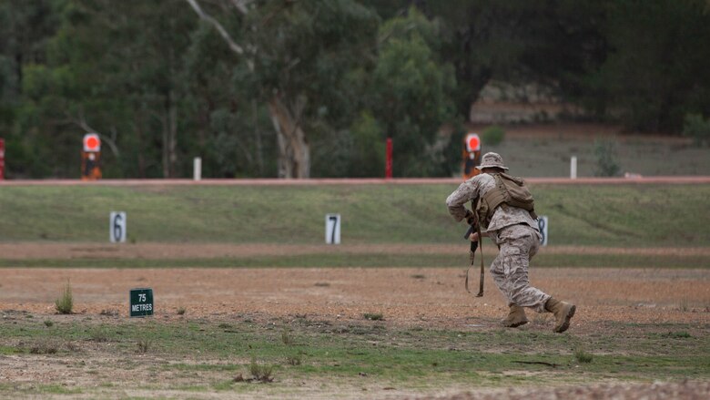 Sgt. Martin Lucero, a competitor with the Marine Corps Shooting Team, runs to the 75-meter firing line at the moving target range at Puckapunyal in Victoria, Australia, May 2, 2016. The MCST joined 20 international teams to compete in the Australian Army Skill at Arms Meeting 2016. The competition tested military marksmen in their capabilities with their service specific weaponry in various scenarios. 