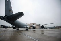 Members of the 459th Operations and Maintenance Groups taxi a KC-135R Stratotanker to the DC Air National Guard hangar on the Joint Base Andrews flight line May 5. Members of the 459 OG and 459 MXG setup the aircraft to serve as a static display for the USO's 75th birthday celebration. (U.S. Air Force photo by Staff Sgt. Kat Justen)