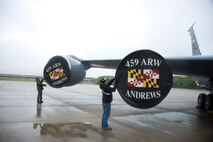 Members of the 459th Maintenance Group place engine covers on a KC-135R Stratotanker on the Joint Base Andrews flight line May 5. Members of the 459th Operations Group and 459 MXG setup the aircraft to serve as a static display for the USO's 75th birthday celebration. (U.S. Air Force photo by Staff Sgt. Kat Justen)
