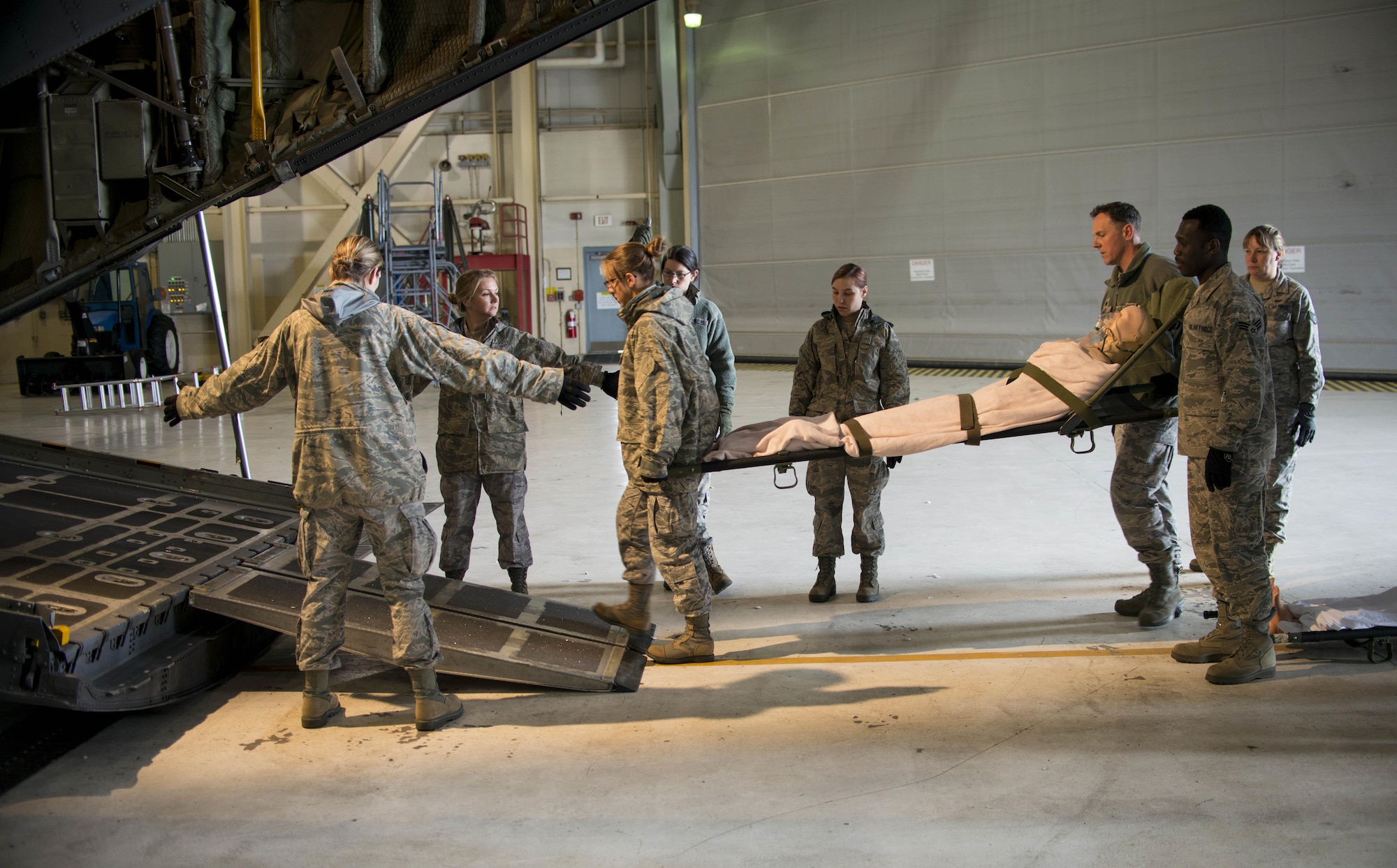 Members of the 914th Aeromedical Staging Squadron are trained on patient transport into a C-130 Aircraft during an exercise, May 2, 2016, Niagara Falls Air Reserve Station, N.Y.  The exercise simulates potential real world activities and allows members of the ASTS to complete annual hands-on training. (U. S. Air Force photo by Tech. Sgt. Stephanie Sawyer)