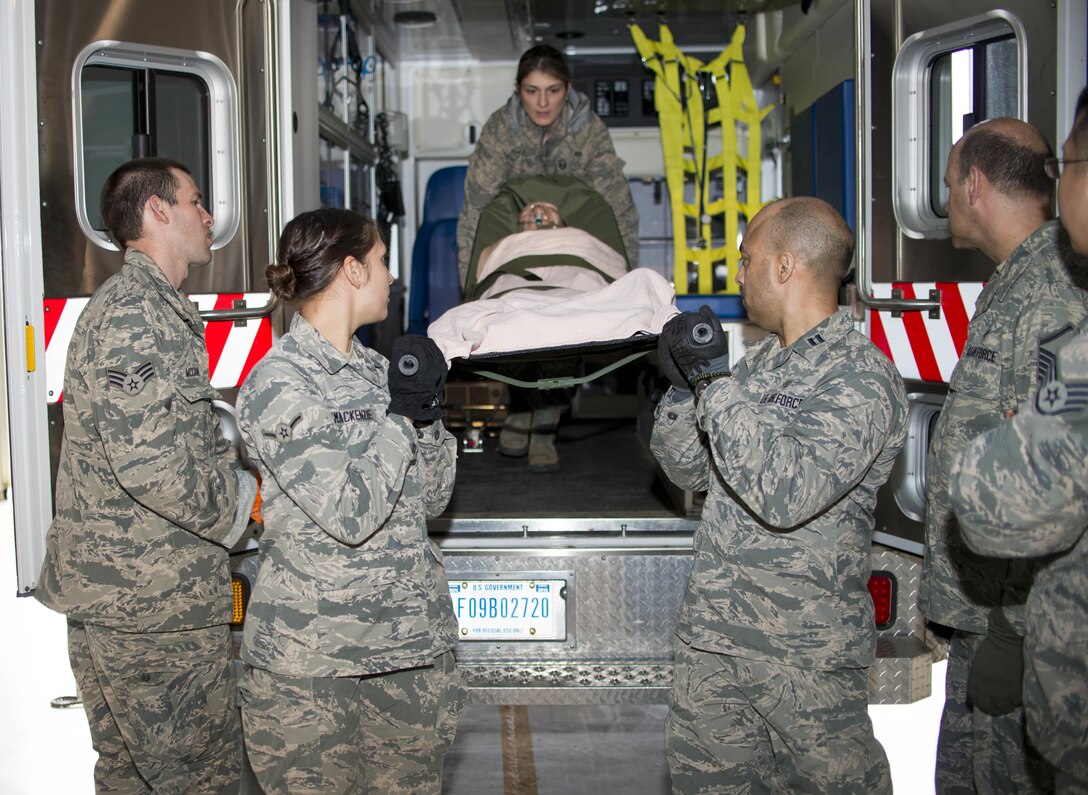 Members of the 914th Aeromedical Staging Squadron are trained on patient transport during an exercise, May 2, 2016, Niagara Falls Air Reserve Station, N.Y. The exercise fulfills annual training requirements ensuring the members are mission ready. (U. S. Air Force photo by Tech. Sgt. Stephanie Sawyer)