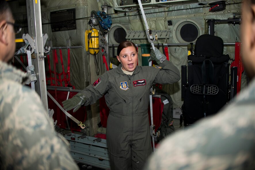 Staff Sgt. Cassandra Embry, 914th Aeromedical Evacuation Squadron, briefs members of the 914 Aeromedical Staging Squadron prior to loading litters onto a C-130 Aircraft during an exercise, May 2, 2016, Niagara Falls Air Reserve Station, N.Y. The exercise fulfills annual hands-on training for members of the ASTS.  (U. S. Air Force photo by Tech. Sgt. Stephanie Sawyer)