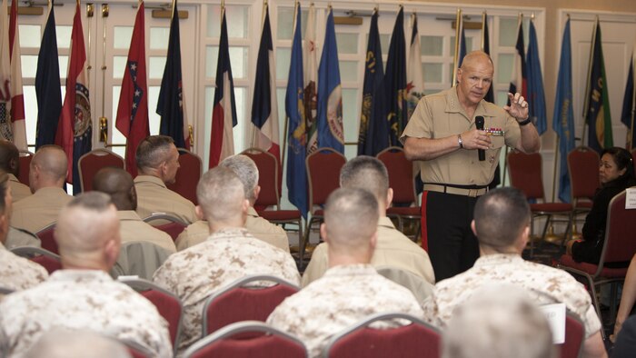 Gen. Robert Neller, commandant of the Marine Corps, speaks to awardees and guests at the Commandant of the Marine Corps Combined Awards Ceremony at Marine Corps Base Quantico, Virginia, May 11, 2016. The ceremony recognized top performing Marine recruiters, drill instructors, combat instructors, career planners, security guards and athletes. 